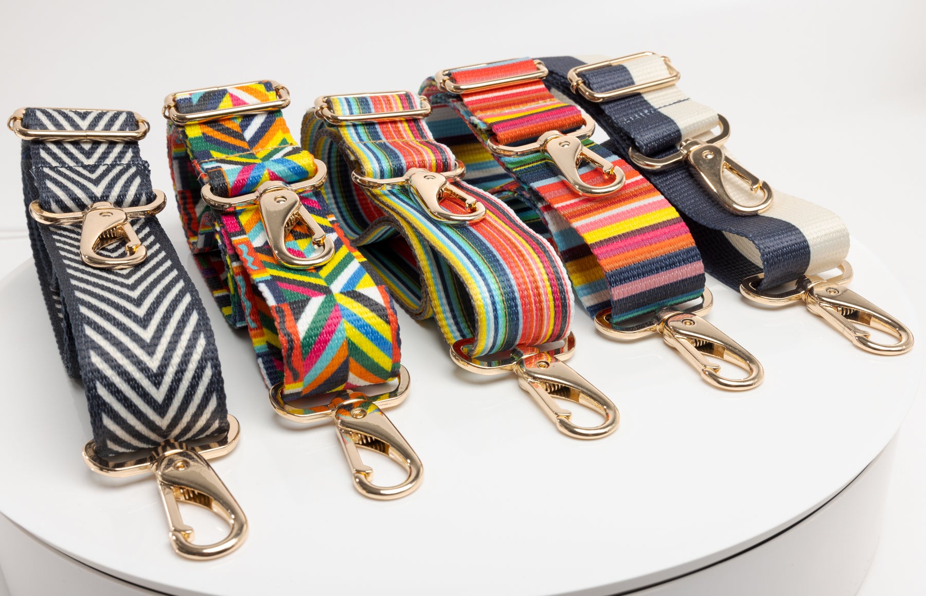 Coba's line of purse straps in a row