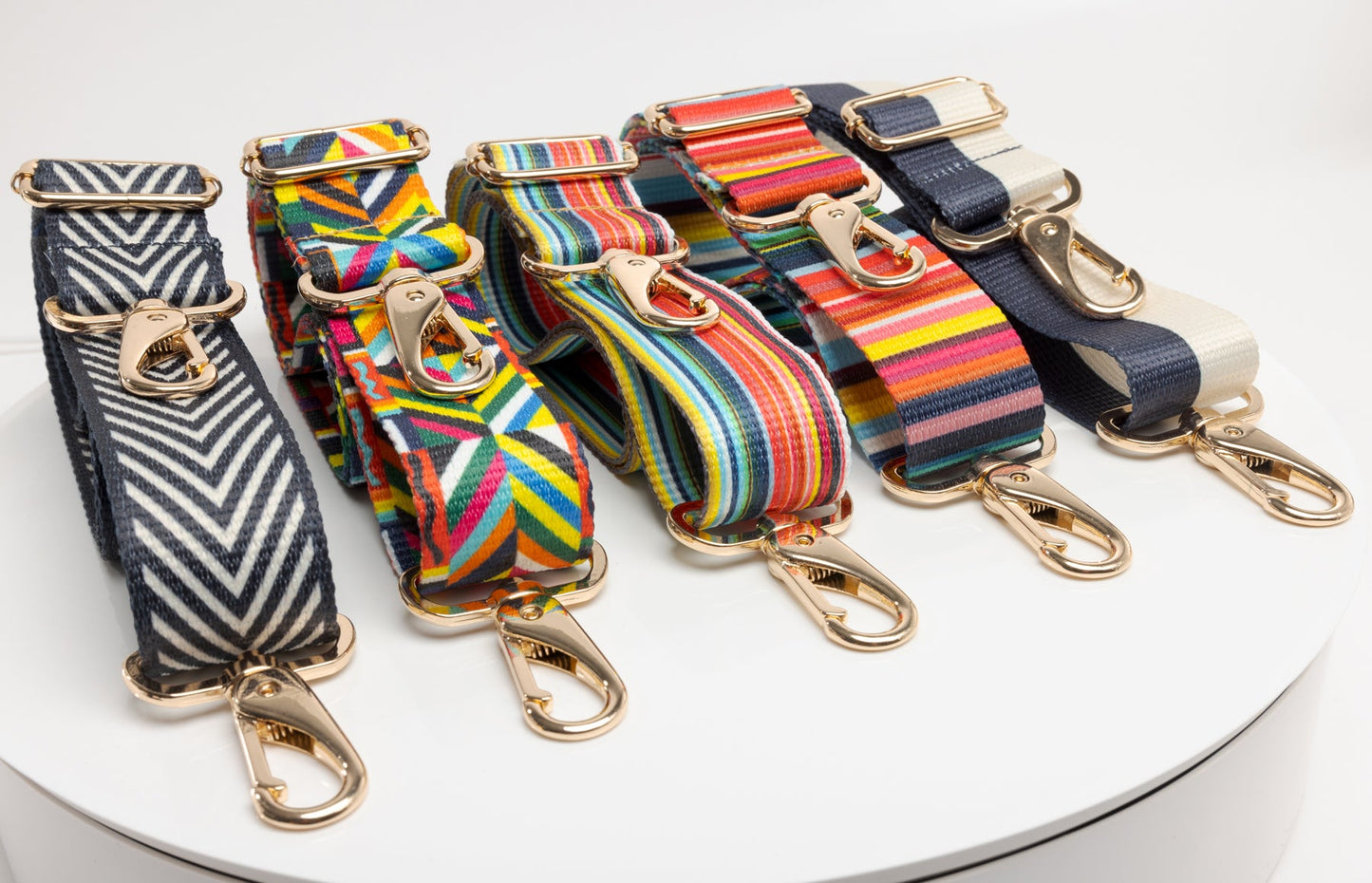 Coba's line of 5 purse straps in a row